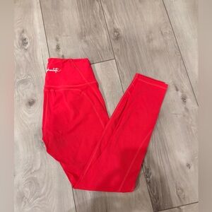 Alphalete Pulse Surge Legging coral color